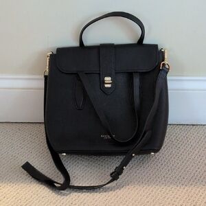 Kate Spade New York Essential Medium North South Tote in black pebbled leather.